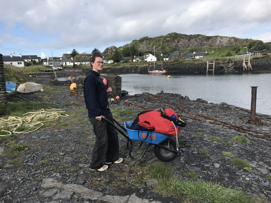 Sarah using the crew wheelbarrow - the only for on transport on the island.